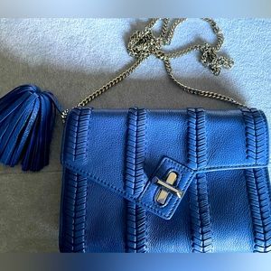 EUC Ela Handbags Genuine Leather clutch w/ metal chain. Comes w/ dustbag.